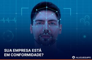 Profissional utilizando sistema de reconhecimento facial no controle de acesso corporativo em conformidade com a LGPD.